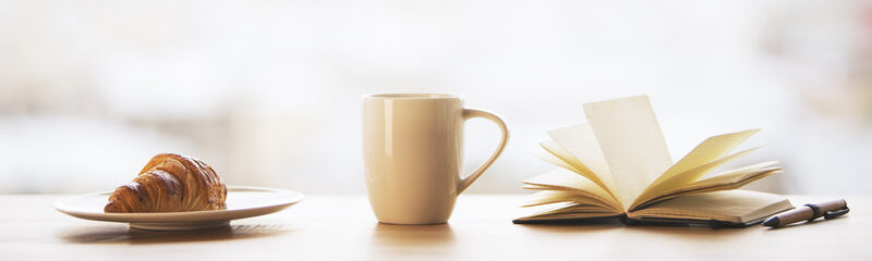 Desktop with coffee and book